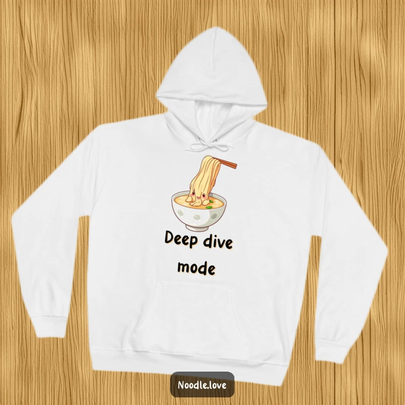 Funny Noodle Dive Hoodie, depicting a noodle character dramatically plunging into a bowl of savory broth, capturing culinary bliss.