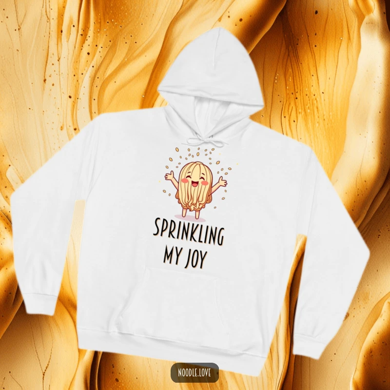 Funny hoodie showcasing a cheerful noodle character joyfully scattering sesame seed confetti, offering warmth and a burst of laughter.