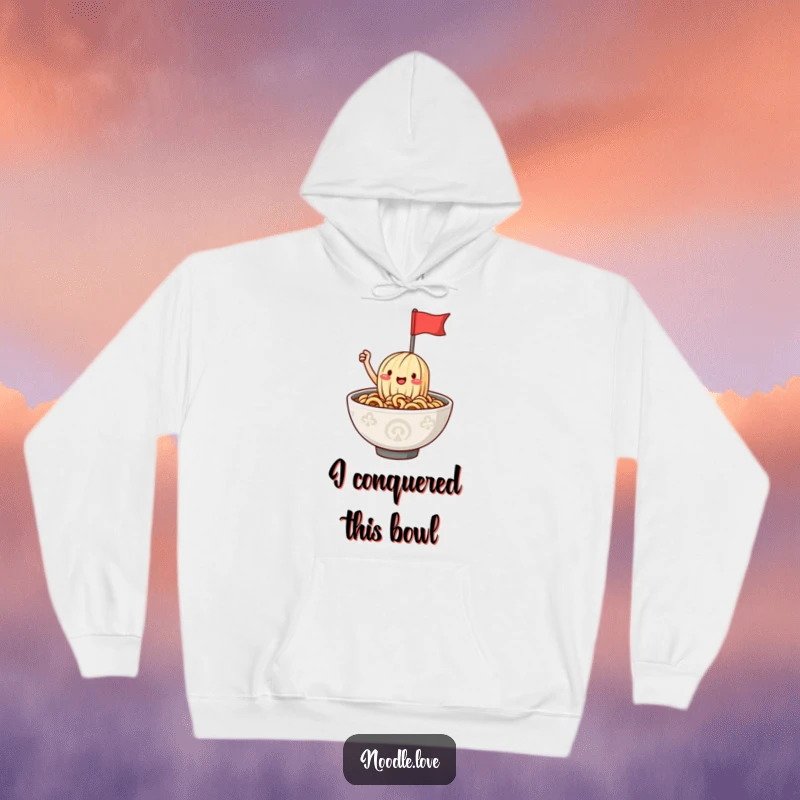 Funny ramen noodle hoodie displaying a happy character waving a miniature flag, perched atop a steaming ramen bowl. A symbol of comfort and joy.